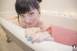 themythofhappiness:  Revisiting my favorite set of Ceres Suicide, Sex Bomb. I love the colours, especially in the third pic, between her skin, the pink water, the tattoos, the blue nail. But of course, what steals the show here is Ceres’s beaty. The