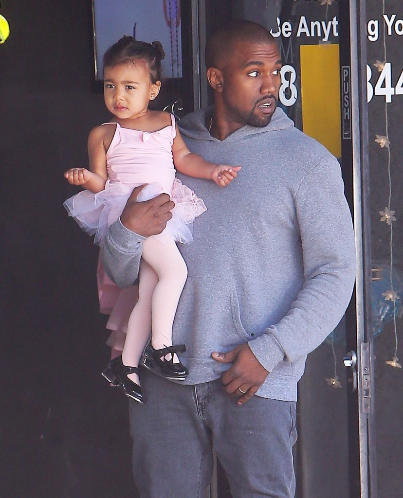 andanampersand:kimkardashianfashionstyle:March 19, 2015 - Kanye &amp; North West