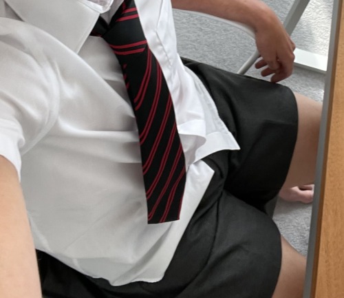 Hanging out at home in school uniform this Summer.