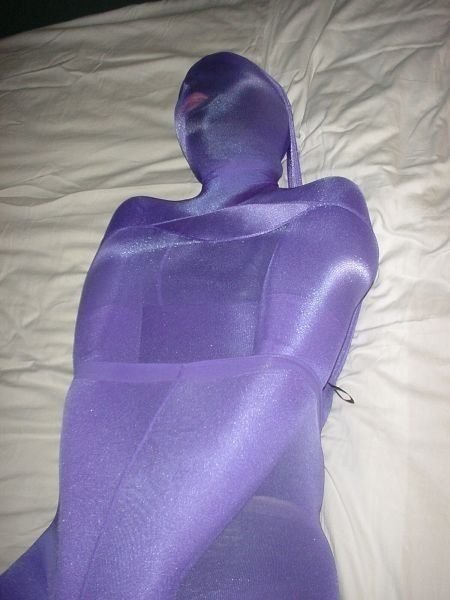 nylonencasementart:  Purple pantyhose mummification.got to love it.