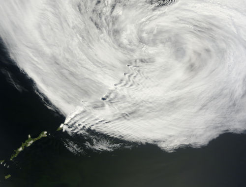 Wave clouds shimmering off the KurilesDropping southwards down the sea of Okhotsk from Russia&rsquo;