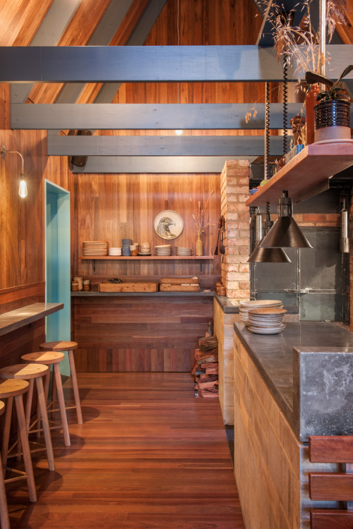 contemporist:  This cute little bar and restaurant was built in between two existing buildings