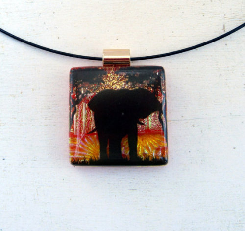African sunset fused glass elephant, giraffe and hyena necklace pendants. I have created three new p