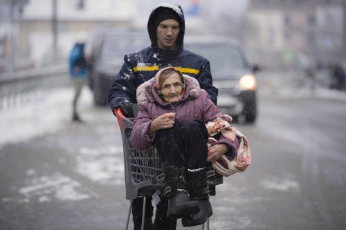 henk-heijmans:Civilians flee Irpin, Ukraine during shelling by the Russian military on March 8, 2022