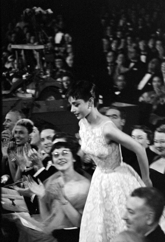 honornyc:  Audrey Hepburn in 1954, winning her first Oscar for “Roman Holiday”