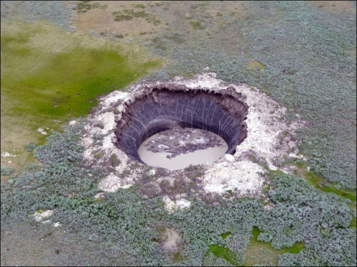 relatetorocks:Crater in Siberia formed from an eruption of methane gas caused by thawing of permafro