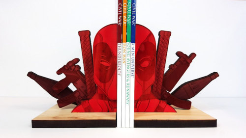 mymodernmet: Playful Pop Culture-Inspired Bookends Bring Intergalactic Fun to Your Shelf