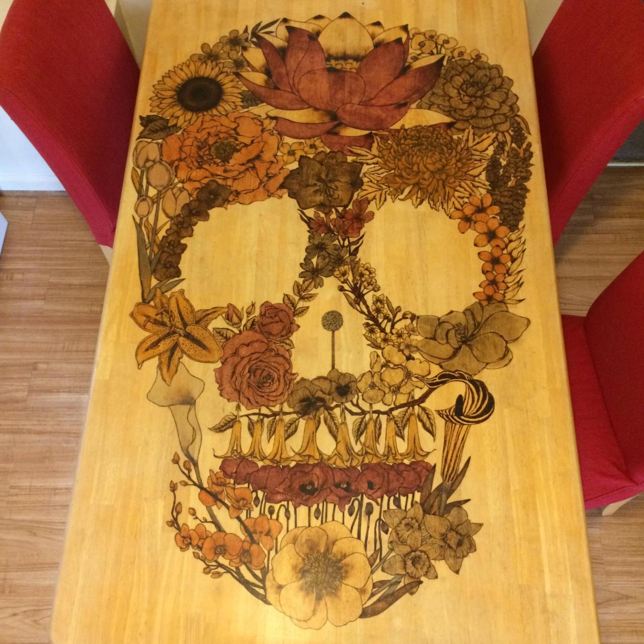 martha-bb:  Flower Skull Woodburning On Kitchen Table