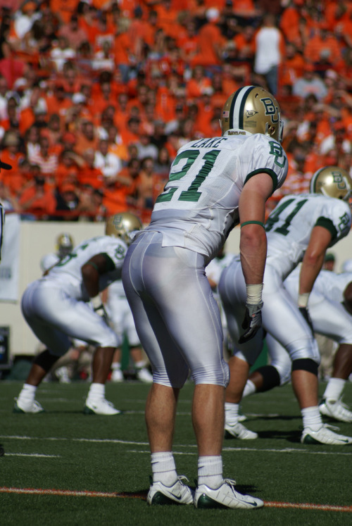 geareric: athletic-collection: Jordan Lake  Black jockstrap under sheer silver football pants… Perfe