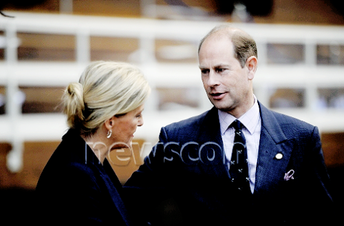 Her Royal Highness The Countess of Wessex adjusting the tie of her husband, His Royal Highness The E