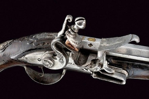 An Italian flintlock pistol originating from Brescia, Italy, mid 19th century. Crafted by Francisco 