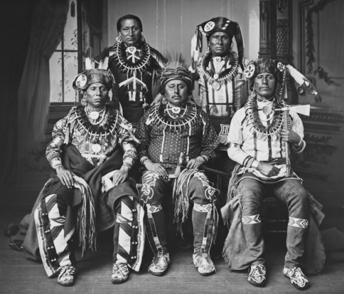 Otoe tribe delegation of five wearing claw necklaces and fur turbans; photo by John Karl Hillers, 18