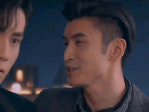 chusheng smiling while talking to lu yao, holding him very close