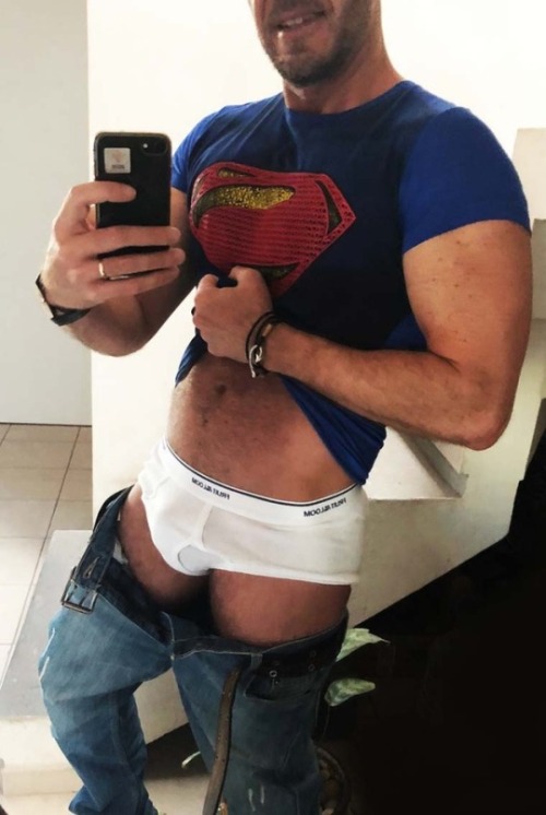 white-briefs-lover:Hmm, his superman T-Shirt fits on his hot upperbody. And I love that he drops his