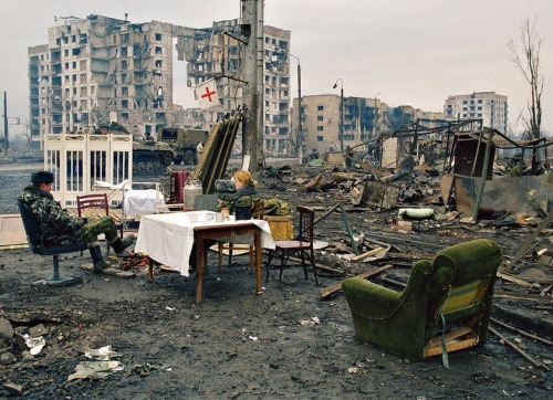 enrique262: First Chechen War, a pair of russian troops rest in an improvised medical station amid t