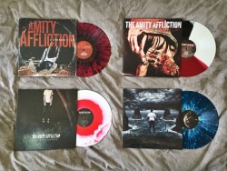 surroundedbyviciouscycles:  The Amity Affliction vinyls Severed Ties red/black splatter ?/300 (first pressing)Youngbloods tricolored ?/500 (second pressing) Chasing Ghosts red centered/white 34/150 (first pressing) Let The Ocean Take Me sea blue/white
