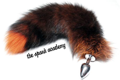 thespankacademy:  Get your last minute orange-and-black Halloween fox tails at The Spank Academy!If you choose Priority shipping when checking out, you’ll get this item by Halloween (lower 48 US states only)!www.thespankacademy.com