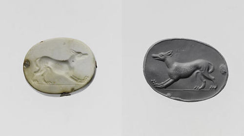 via-appia:Carnelian scaraboid seal, wolf with tail between legsGreek, Ionian, ca. 450–400 B.C.