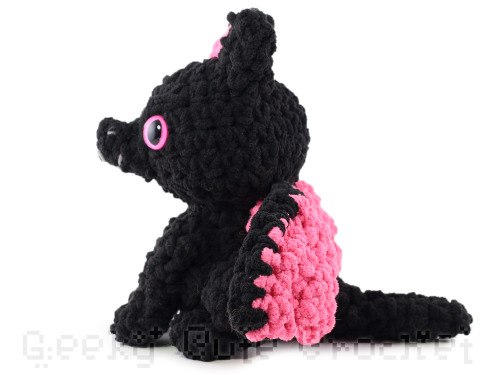 Black and pink dragon with sparkly glow-in-the-dark eyeswww.etsy.com/listing/792995211/