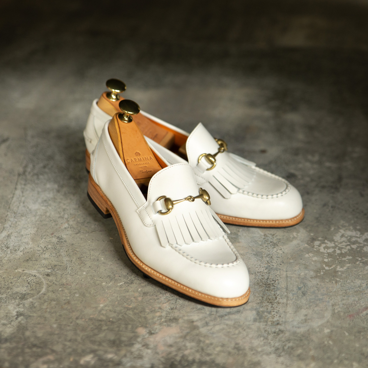 white horsebit loafers