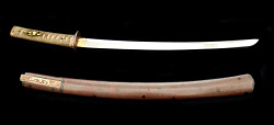 art-of-swords:  Wakizashi Sword Dated: late Edo Period: 1603-1867 Culture: Japanese Medium: steel, copper, ray skin, silk, wood Measurements: blade length: 55 cm. Tang lenght: 12 cm The tang (part of the blase encased by the handle) measures 12 cm.