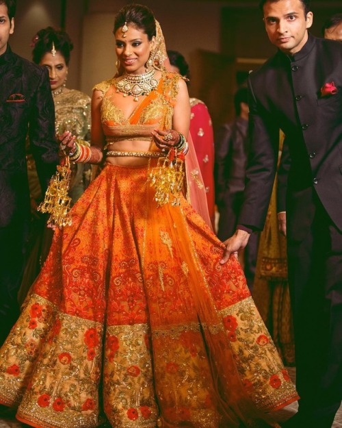 Photography: 361 Degree ProductionsWhen the bride slays in a marigold colored lehenga! 