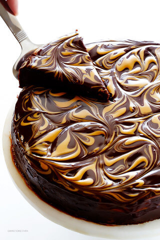 choco-chocoholics:Peanut Butter Flourless Chocolate Cake