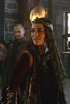 periodcostumelover:Morgan Pendragon’s red dress & crown in Camelot 1x03