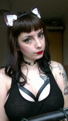 royeah:  Im a slave away from being a one cute dominatrix :D Collar, harness and cat ears all by Licorice&amp;Lace 