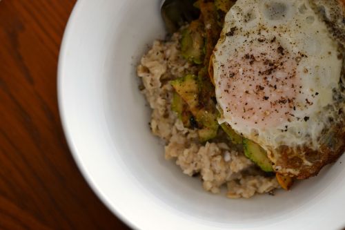 much belated breakfast #2 this weekend is oatmeal with summer squashes and eggplant and a crispy egg