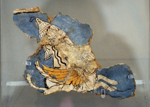 greek-museums:  National Archaeological Museum / Archaeological Site of Mycenae:  Fragments of murals from the Acropolis of Mycenae (13th century  B.C). Α female figure in a procession, holding a lily- perhaps an offering to the goddess. The fashionable