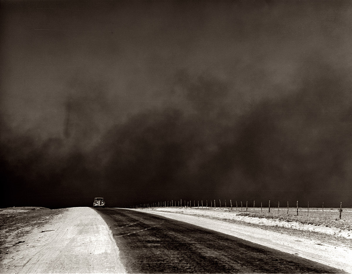 Arthur Rothstein. Heavy black clouds of dust rising over the Texas Panhandle, 1936.