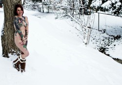 inkedbitch91:  #boots #snow #tatted #me #redhair  Photo credit : Nevermore Studios