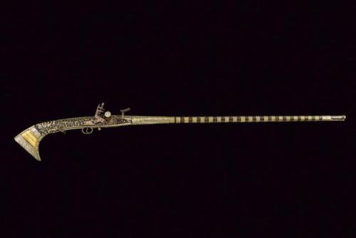 An ornate snaphaunce moukala musket from North Africa, 19th century.from Czerny’s International Auct