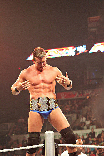 rwfan11:  Ted DiBiase Jr.  Nice pic! He’s such a show off with that title! And look at that bulge!