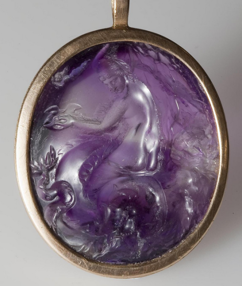 archaicwonder:Roman Amethyst Intaglio of a Girl Riding a Sea Monster, 1st Century BC/ADThis was poss