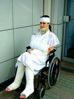 Brokenlegsblog:  Poor Girl With Bandages And Casts On A Wheelchair