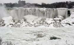 sixpenceee:  Contrary to some reports, Niagara Falls didn’t totally freeze, but the polar vortex  formed enough ice to create some spectacular images. Source: Aaron Harris