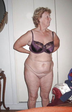Flabby older lady poses in just a bra!Your