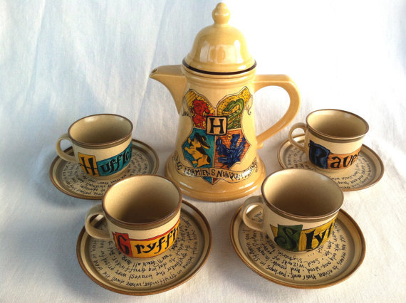 wickedclothes:  Harry Potter Hogwarts Crest Tea Set A massive crested tea pot, and
