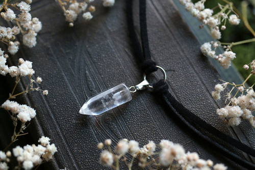 90377:This beautiful clear quartz necklace with polished point and faux black leather strings is now