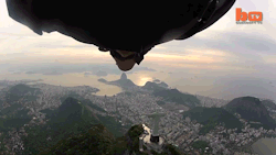 fencehopping:  Wingsuit flyby of Christ the Redeemer in Rio de Janeiro, Brazil. 