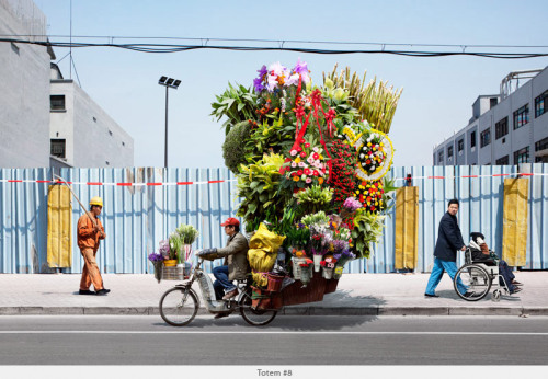 Impressive bike stacking skills of bike couriers in Shanghai captured in photographs by Alain Delorm