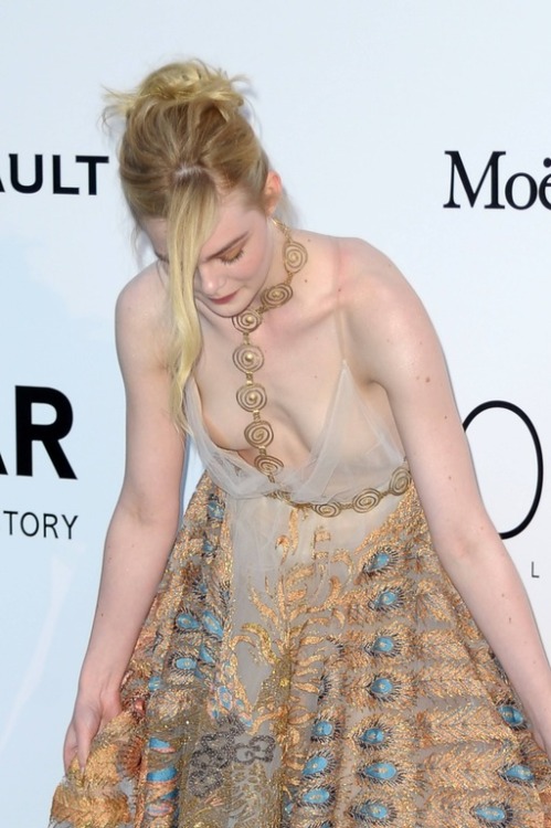 celebritiesuncensored: Elle Fanning downblouse  at Cannes