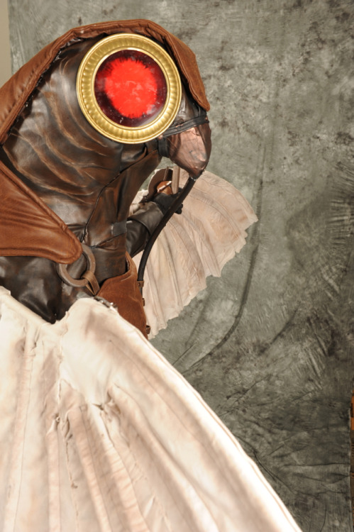 gravekeeperlove:  These were done by the awesome people at the Otakon photo suite. Their crew was super helpful and patient. So glad I managed to drag the bird up there.  Songbird- me 