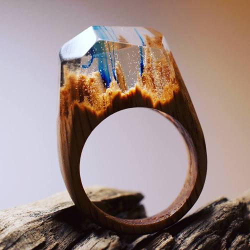 sixpenceee:  The carving inside this wooden ring is absolutely gorgeous! I found the website where they are made: http://www.mysecretwood.com/