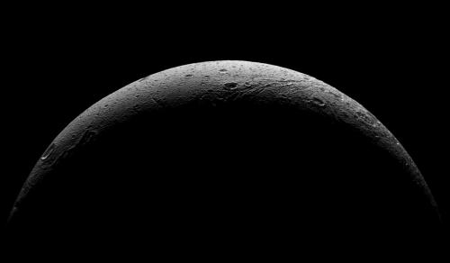  NASA’s Cassini spacecraft captured this parting view showing the rough and icy crescent of Sa