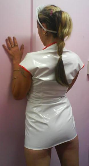 nurselover:  Love the pvc gathering around the back of her neck and taught over her bum. <3