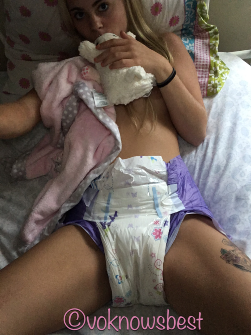 voknowsbest:  This diapered princess cuddled her bottle pet lamb named ivy all night and finished the whole bottle then fell asleep and went potty all night long and woke up in a soaked and squishy lavender that is still so comfy  - Vo 