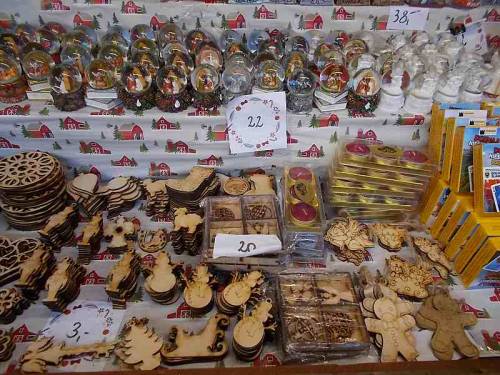 Interesting merchandise made of wood. Christmas market offer in the city Wroclaw, Poland.